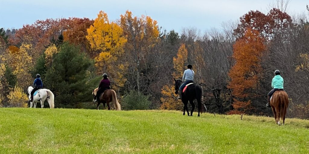 Riding horses at Owl's Nest in the White Mountains
